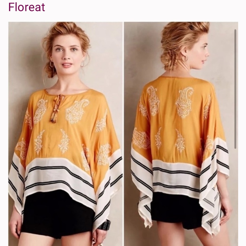 This is an Anthropologie Floreat Embroidered Paisley Boho Poncho Sunglow